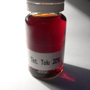 Tolu balm tincture sample displaing a nice ambery colour